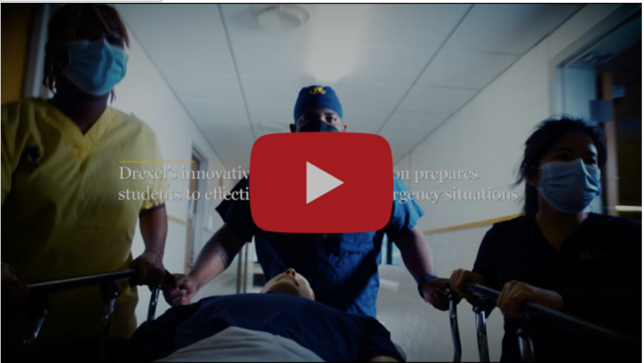 Play button in the center of a photo with three nurses pushing a hospital bed.